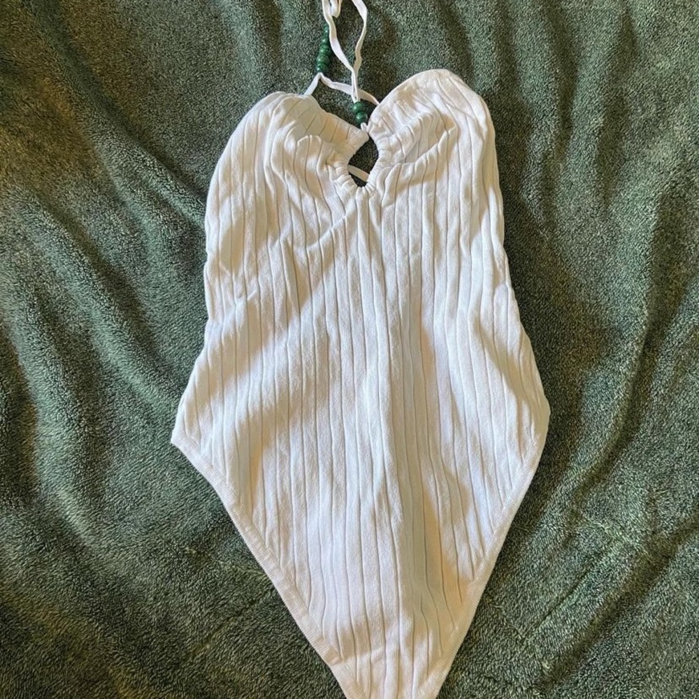 white body suit with beads